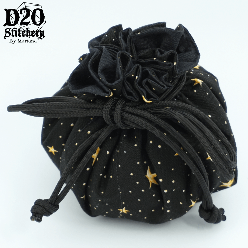 Tied epic dice bag with 5 point yellow stars and white/yellow dots on the background