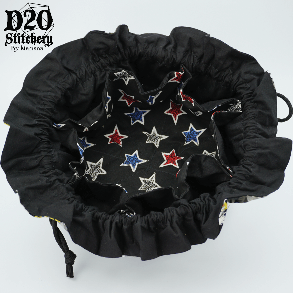 Open epic dice bag showing the alternate interior fabric with Red, blue, and white stars and the 8 pockets.