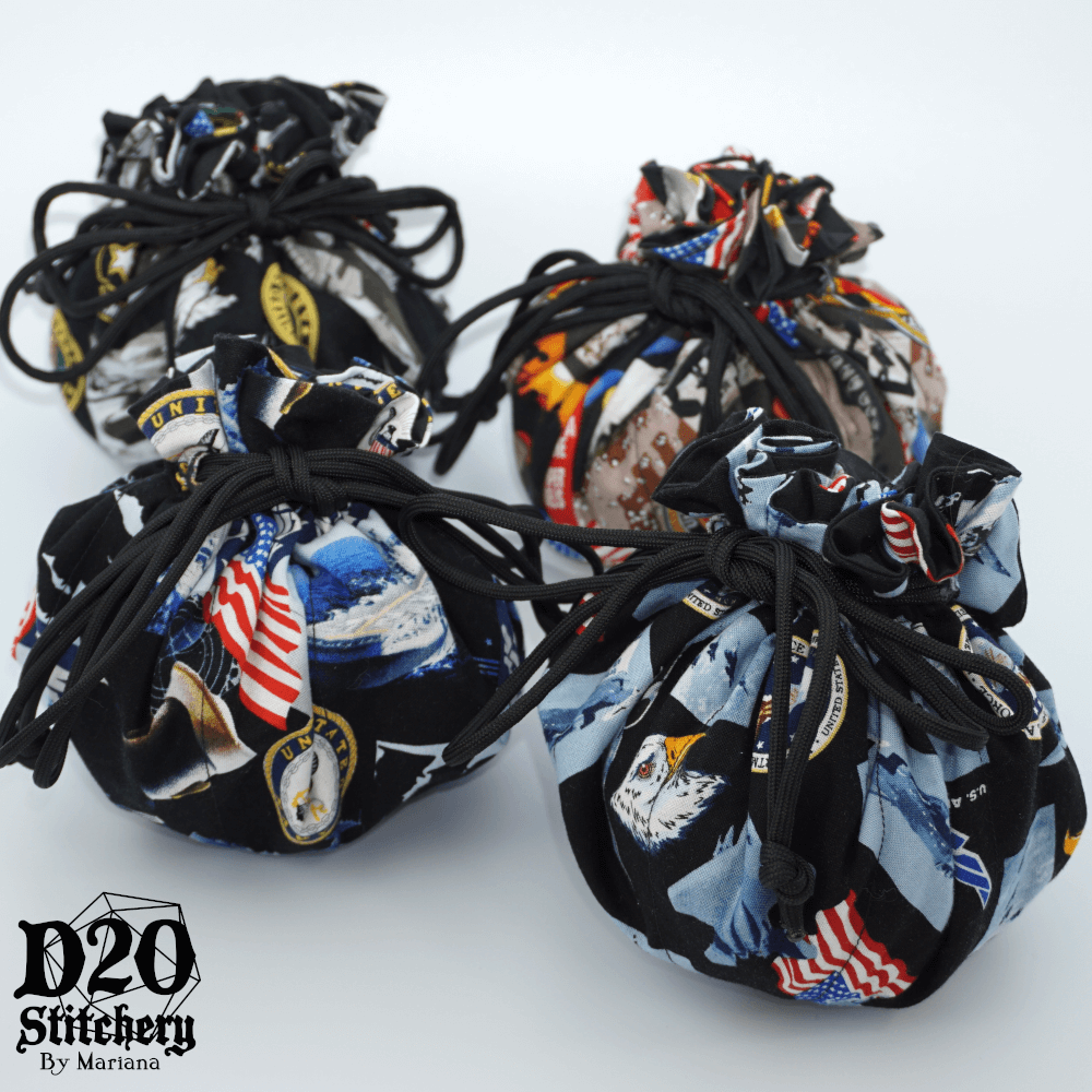 Group of 4 Tied Epic Dice Bags in USA military branch pattern fabric.