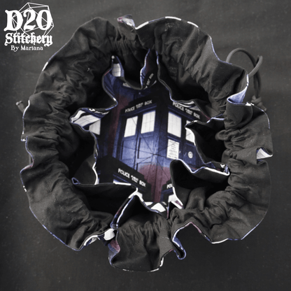 Open epic dice bag with Dr. Who Police Call Box Corner View fabric showing matching interior fabric, black lining, and 8 pockets.